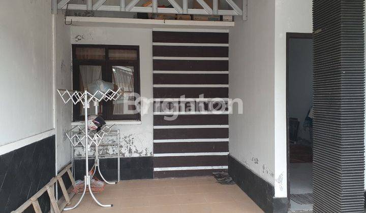 RUMAH SIAP HUNI DI LINGKUNGAN PERUMAHAN CLUSTER 2