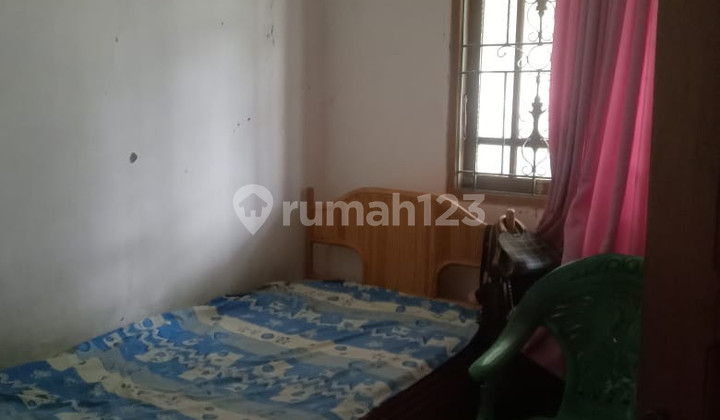 kamar tidur rumah di villa bogor indah
