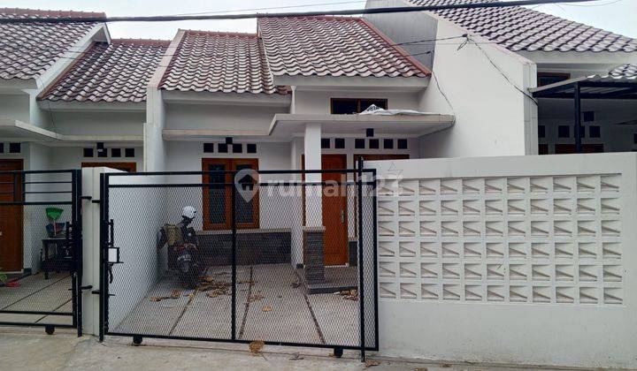 RUMAH MINIMALIS DI BEDAHAN PANCORAN MAS SAWANGAN DEPOK, HARGA 500 JUTAAN, SHM, DEKAT PINTU TOL, RUMAH SAKIT, SEKOLAH NEGERI, STASIUN KERETA, MALL. HARGA TERJANGKAU. 1