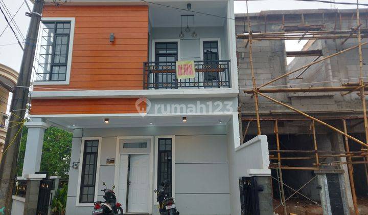 Dijual Rumah 2 Lantai Dekat Pintu Tol Sawangan, KT 3 KM 3. Dekat Stasiun Depok, Mall DTC, Sekolah Negeri dan Swasta Ternama, RS Permata Depok, Pusat Belanja dan Kuliner. 1