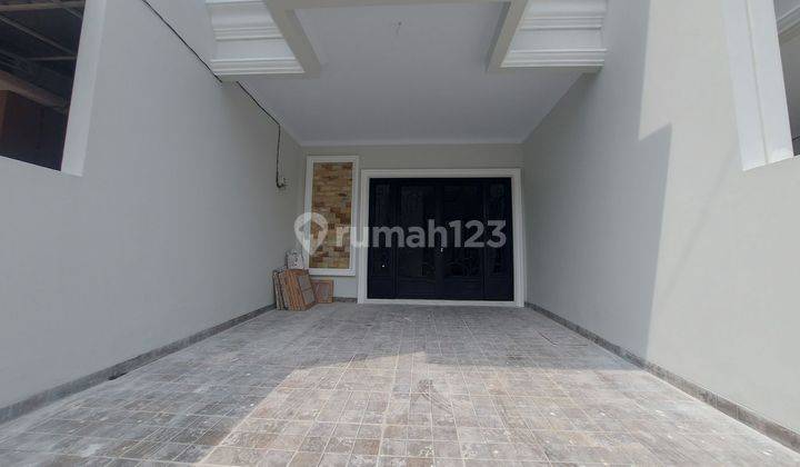 RUMAH 2 LANTAI + ROOFTOP, 3 KT 3 KM DEKAT PINTU TOL KUKUSAN, BEJI - DEPOK 2