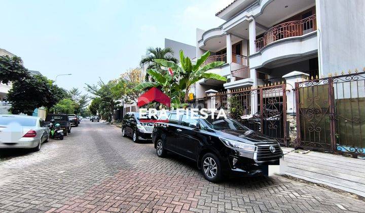 Kavling di puri kencana sudah ada rumah sedikit 1