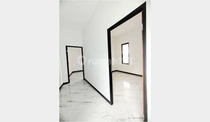 ruang keluarga rumah baru perum pondok indraprasta