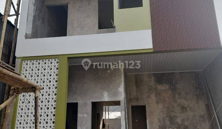 Rumah 2 lantai di apit 2 pintu tol dan nempel universitas indonesia 1