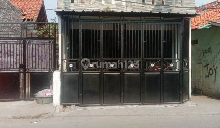 Di jual Rumah dan toko di jalan utama 1