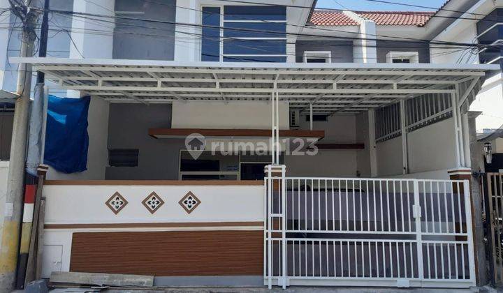 Rumah 2 Lantai Bagus SHM di Lebak Indah, Surabaya 1