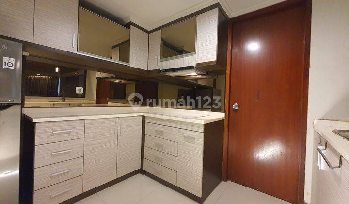 Dijual Apartemen Kondominium Taman Anggrek Semi Furnish, Bagus 1