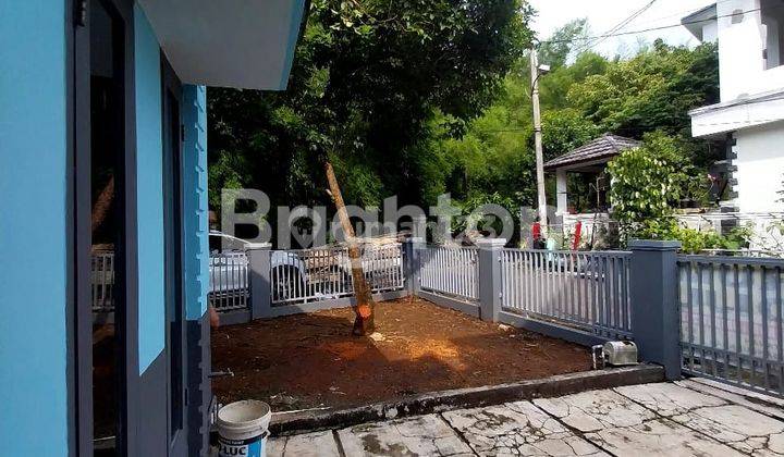 RUMAH DENGAN PEKARANGAN LUAS 2