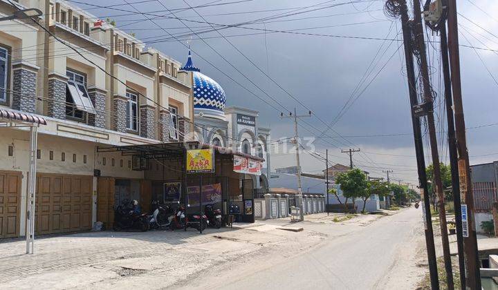 RUKO SIAP HUNI TEMBUNG LOKASI RAMAI DEKAT MESJID  1