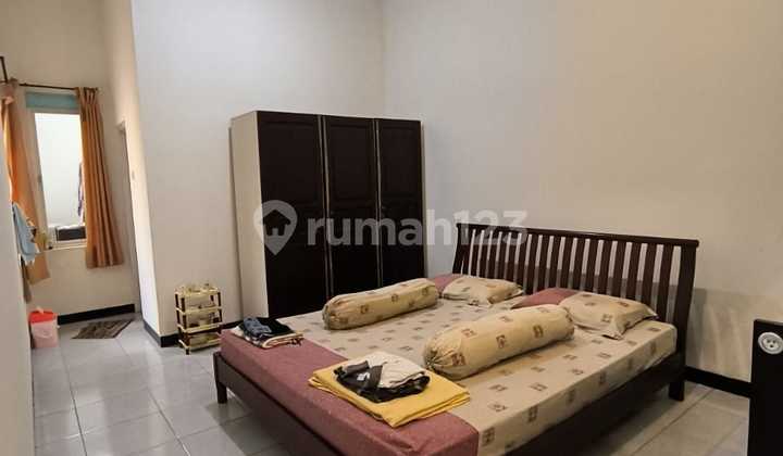 Rumah Modern Cluster One Gate di Taman Holis Indah 2 2