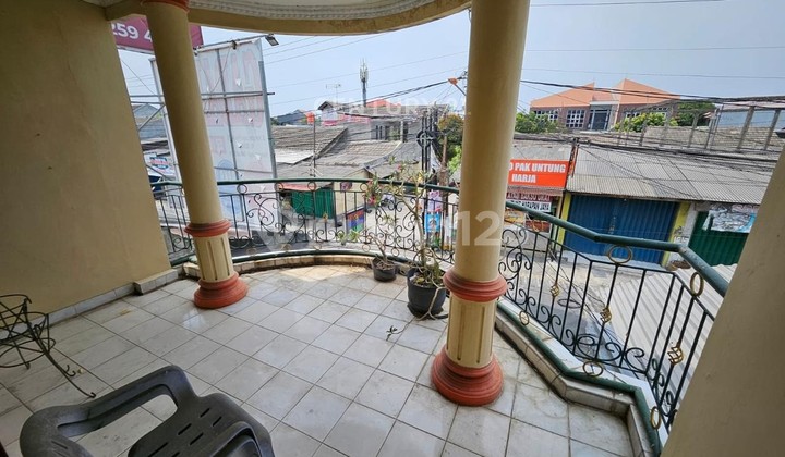 One and a Half Story House with Commercial Space in Harapan Jaya 2
