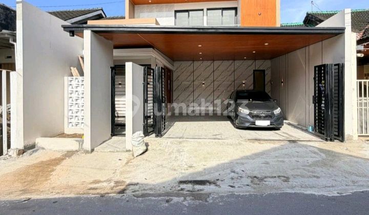 Contemporary Luxury 2-Story House in Purwomartani, Highly Strategic Location with Beautiful Modern Quality.