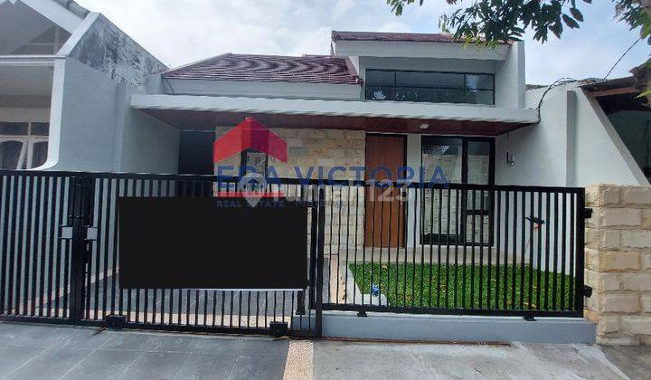 Rumah 1 1/2 lantai baru renovasi full bangunan di Sawojajar 1