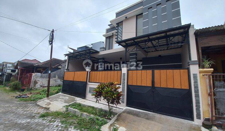 rumah baru 2 lantai di Graha Valensia dekat Binus