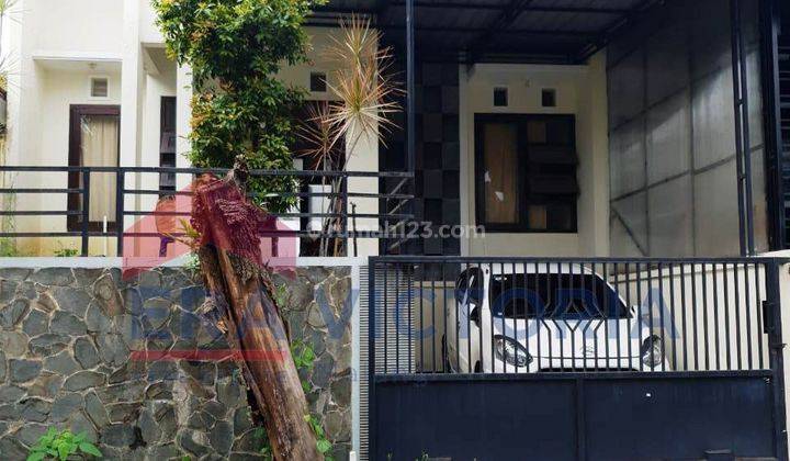 Rumah minimalis dengan halaman belakang luas 2