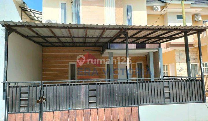 Rumah pojok minimalis cantik di Sulfat Indah 1