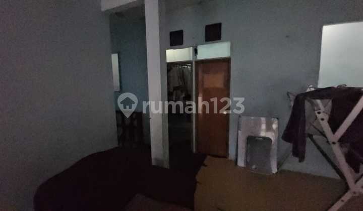 For Sale 9X11 House with 2-Car Row Street in Tanjung Duren 2