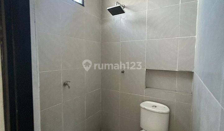 Rumah 2 Lantai the Fazza De Naila Village Driyorejo Barat Surabaya  1