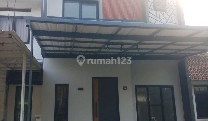tampak depan rumah baru 2 lantai di