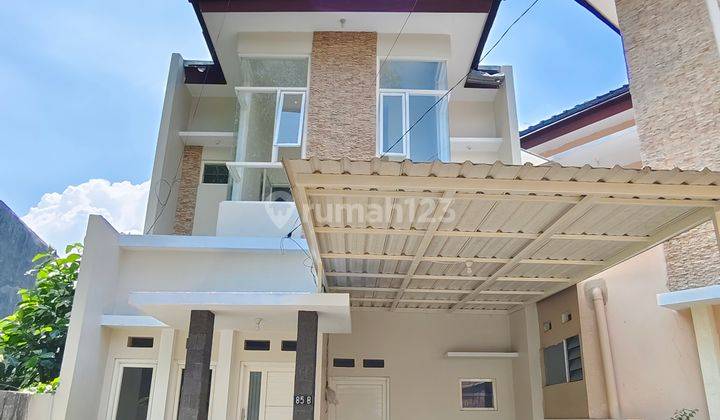 SECEPATNYA RUMAH DUA LANTAI CANTIK & BAGUS MODERN SIAP HUNI HARGA TERJANGKAU 1