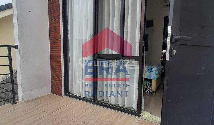 Rumah Strategis 2 Lantai di Cluster Melia Grove Graha Raya 2