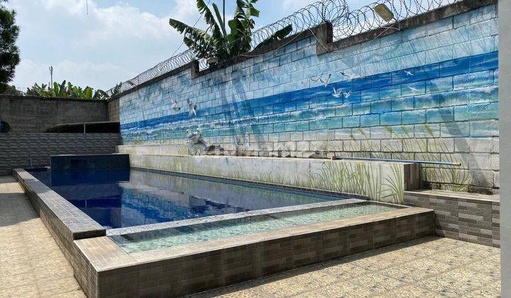 kolam renang rumah villa di villa trinity