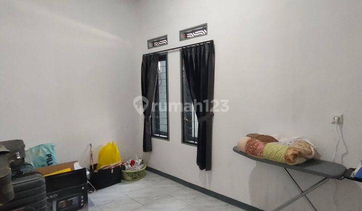 Rumah Bagus di Taman Kopo Indah 1 SHM Barat 2 Lantai 2