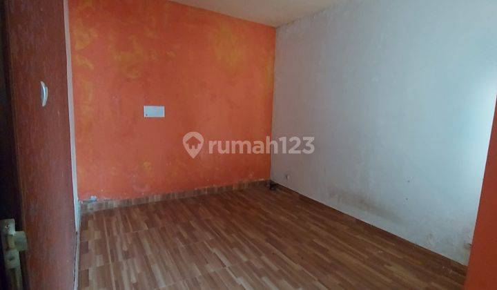 Dijual rumah 2 lantai perlu renovasi lokasi sandat residence one gate sistem lokasi dekat jalan nangka selatan dan jalan suli 14