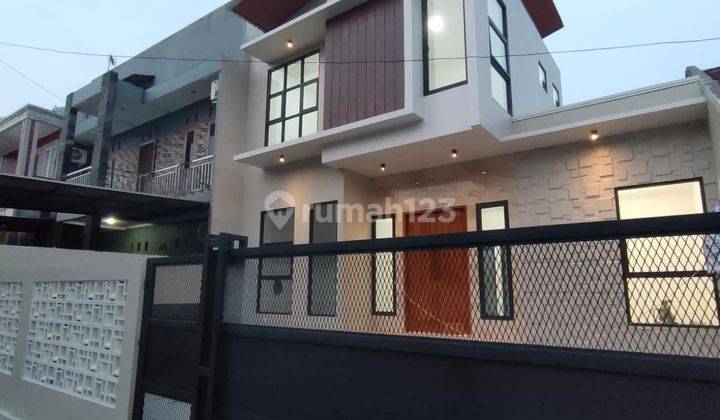 Rumah Murah.. DiJual Cepat Rumah Baru  Industrial SHM ada backyard luas  di Nusaloka terdepan BSD 1