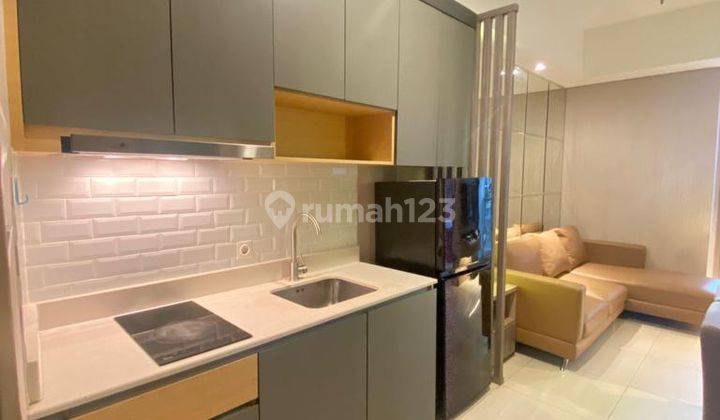 Disewakan Apartemen Taman Anggrek Residences 2 Kamar Tidur Bagus Furnished 1