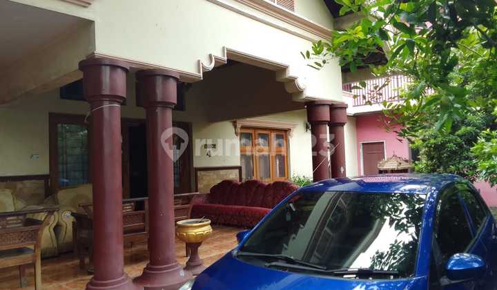 Ready-to-Occupy House with Spacious Land and 2-Storey Shop Building in Jombang 2