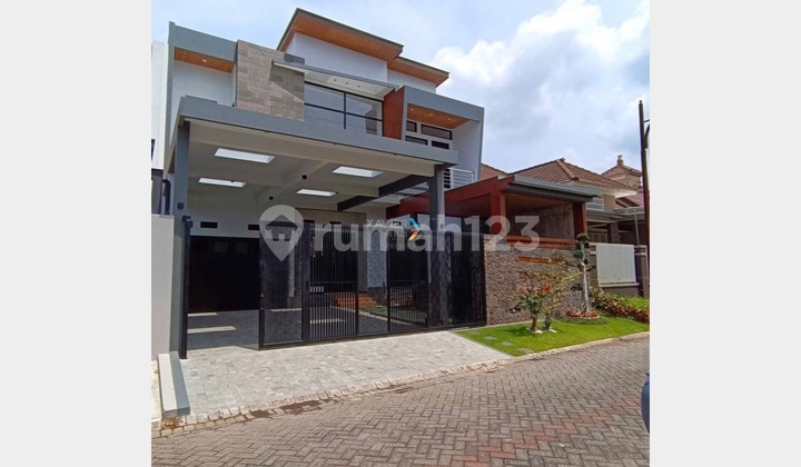 Rumah Baru Gress Desain Modern di Araya Golf, Malang