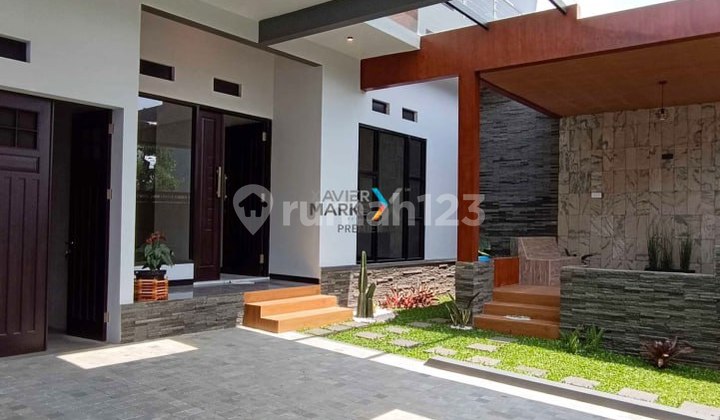 Rumah Baru Gress Desain Modern di Araya Golf, Malang 2