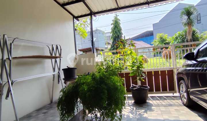 JUAL CEPAT RUMAH 2 LT SEMI FURNISHED DI REGENSI MELATI MAS