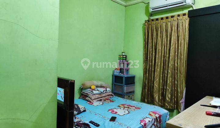 kamar tidur rumah di perumahan wisma harapan