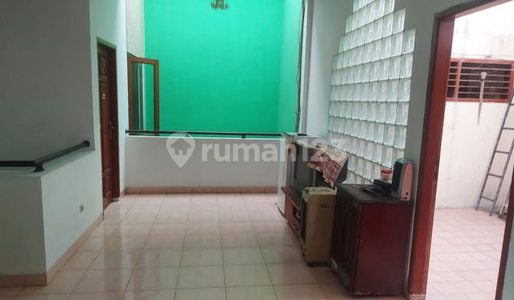 affordable 2-story house 4 bedrooms wide road flood-free in Kelapa Gading 2