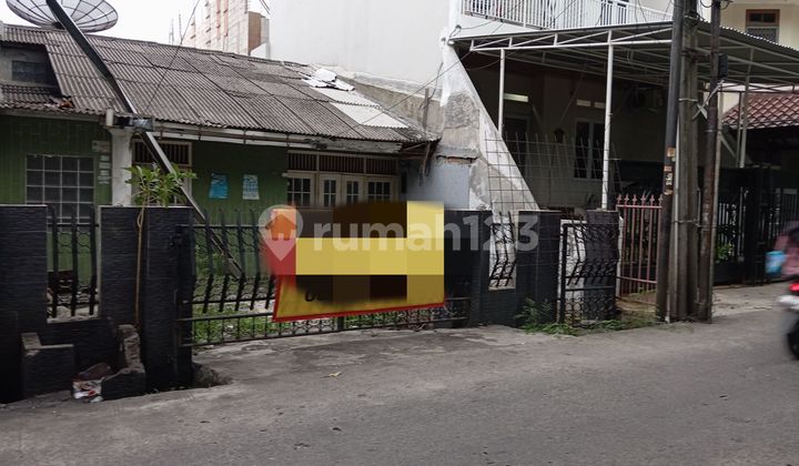 Rumah tua hitung Tanah jalan raya strategis di Kelapa gading 