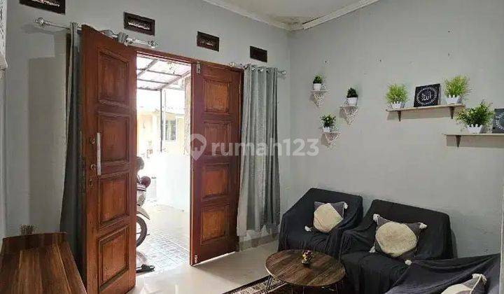 Rumah rapi Lt 73 m² siap huni di cluster Eldora Graha raya 1