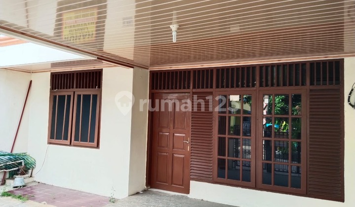 Rumah Hadap Lapangan di Harapan Baru 1 Dekat KRL Cakung 2