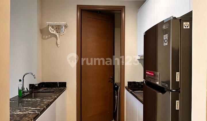 Warm White 2 Bedroom Plus Apartemen Taman Anggrek Residence 2
