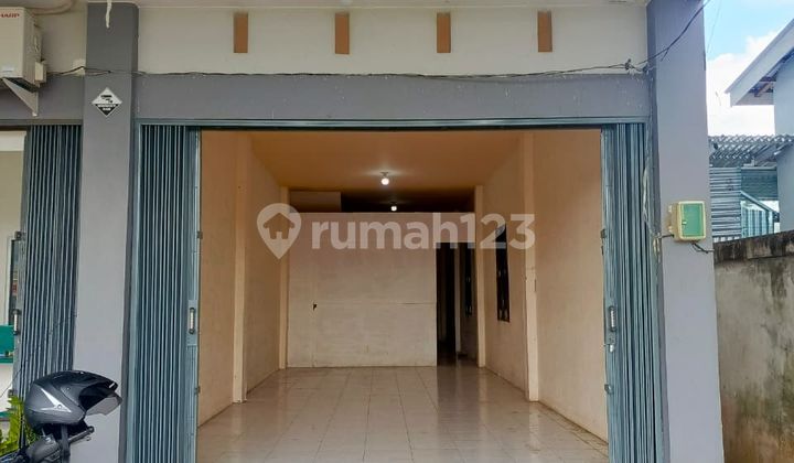 Shop House by the Road Ready for Business in a Bustling Environment on Perdamaian Street 2