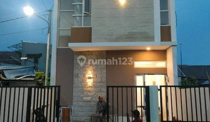 Rumah baru 2 lantai lokasi dalam  perumahan SHM 1