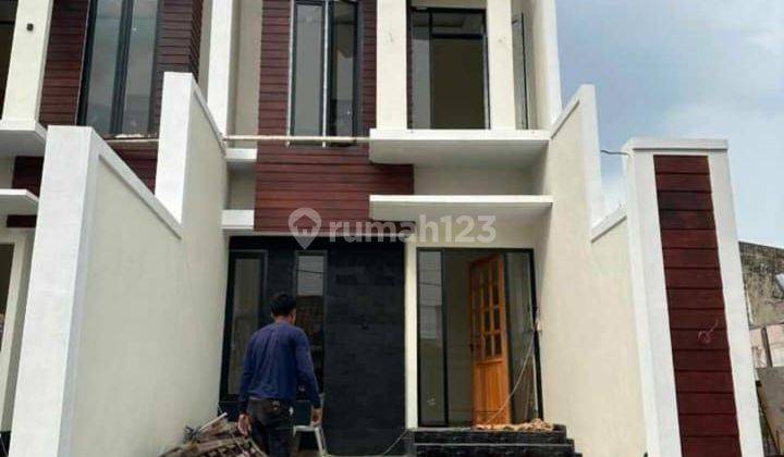 Rumah baru mewah minimalis tengah kota 1