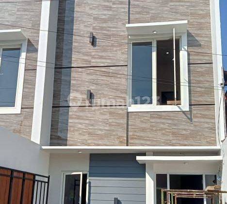 Rumah baru 2 lantai dalam perumahan di Rungkut asri utara 1