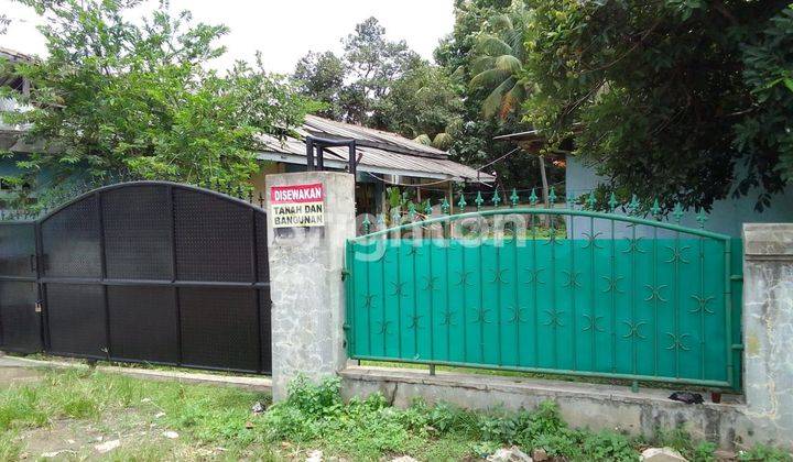 RUMAH PINGGIR JALAN DENGAN HALAMAN LUAS DI TAPOS DEPOK 1