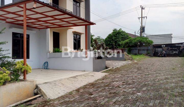 RUMAH 2 LANTAI DALAM PERUMAHAN 2