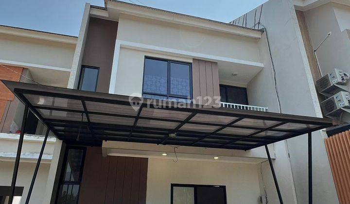 Rumah 2 Lantai di Grand Kencana One jual cepat.5649 1