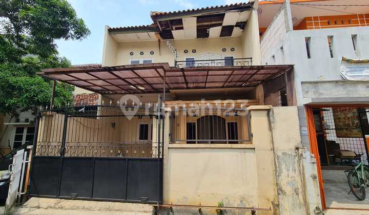 Rumah di Griya Permata. 2 Lantai. Harga Nego