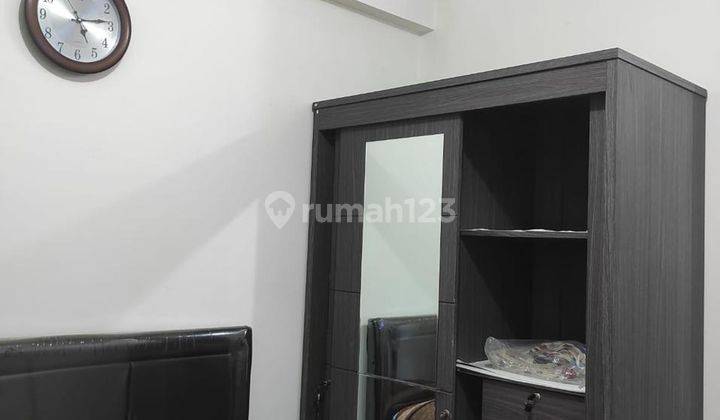 Apartment Puncak Dharmahusada Merr Full Furnish 1