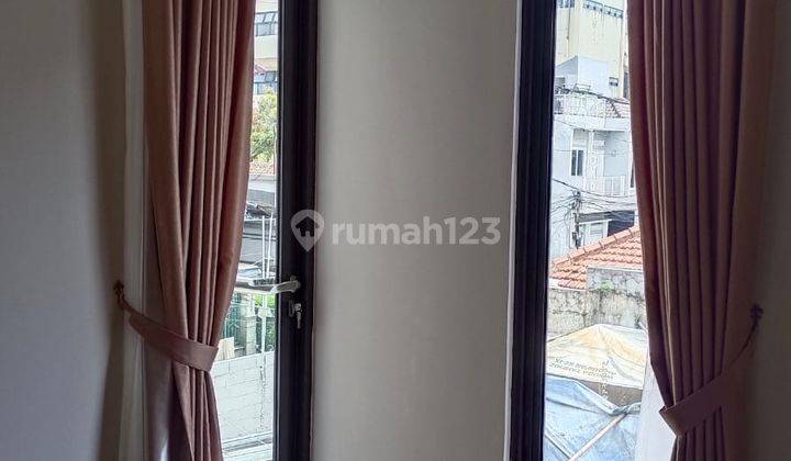 Rumah mewah di  minimalis asri nan sejuk cempaka putih jakarta pusat 7